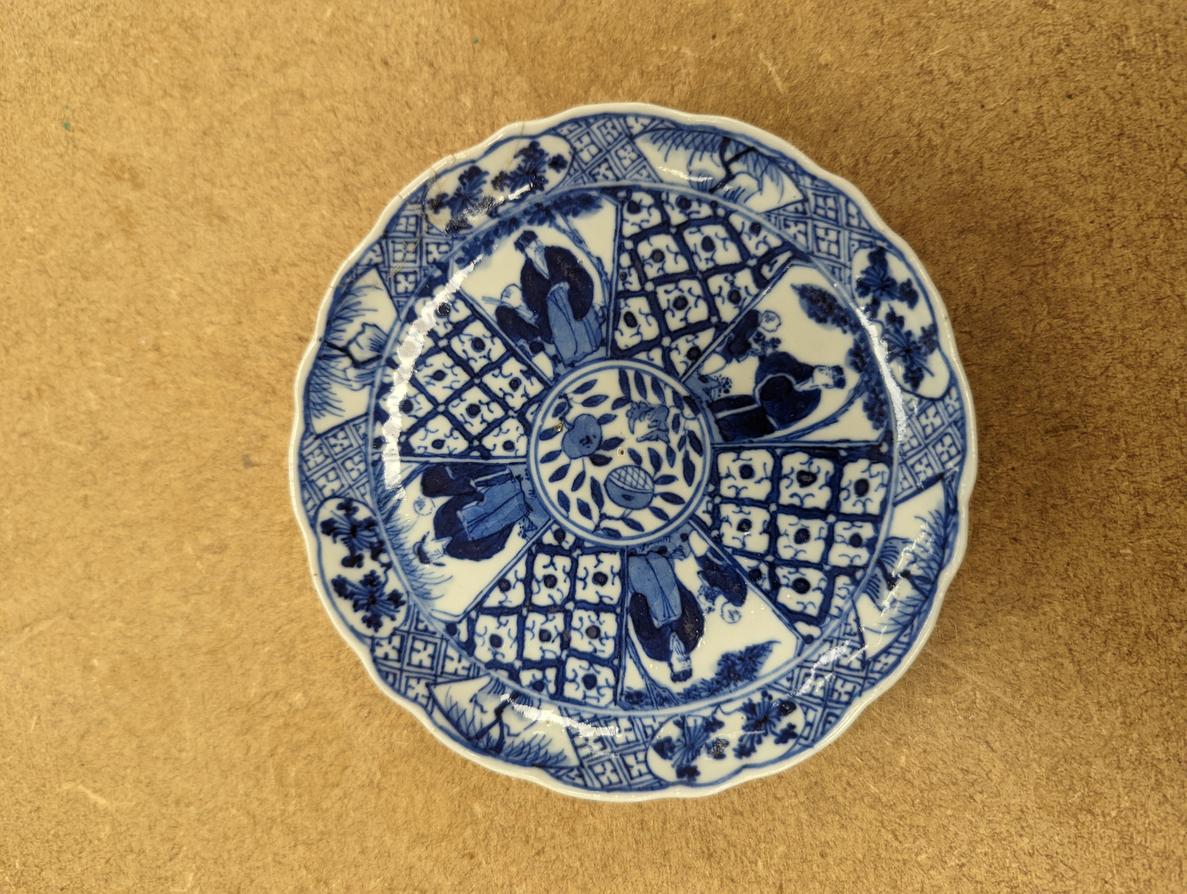 Two Chinese porcelain saucer dishes and an enamelled porcelain vase, 18th century and later, 12.5cm